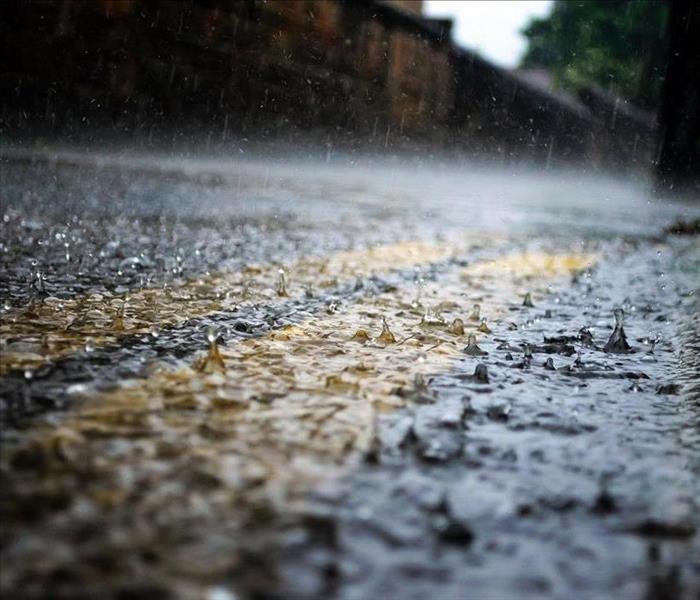 Rain falling on a road